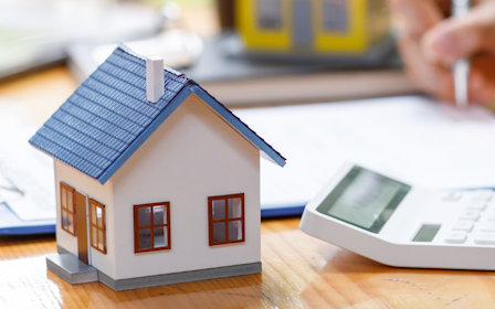A person working on a laptop.