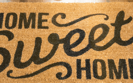 A cardboard sign on a table.