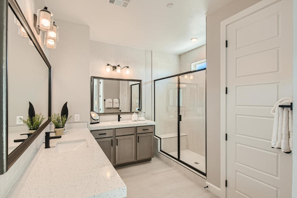 A bathroom with a glass shower.