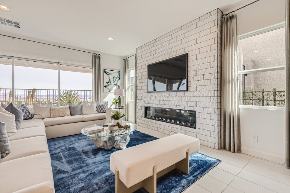 A living room with a fireplace.