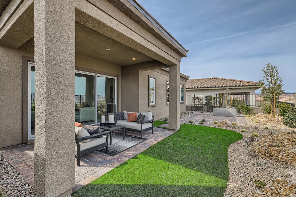 A house with a large front yard.