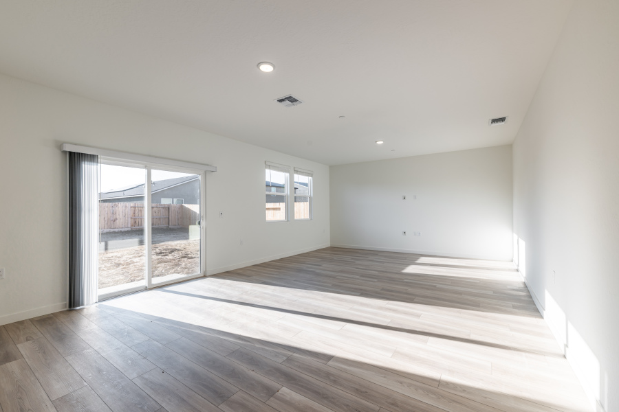 A room with a wood floor and a wood floor.