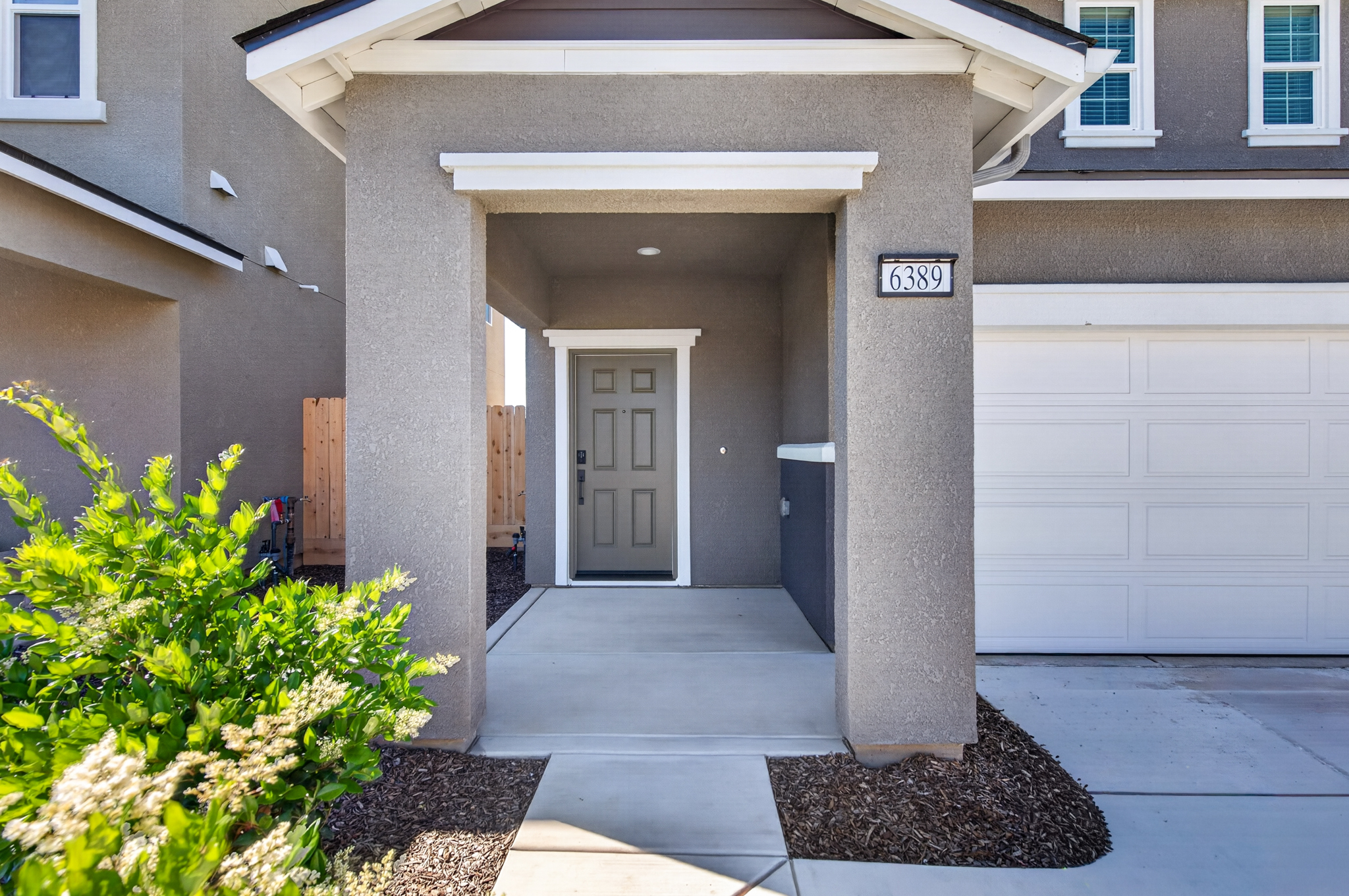 A building with a white door and a white door.