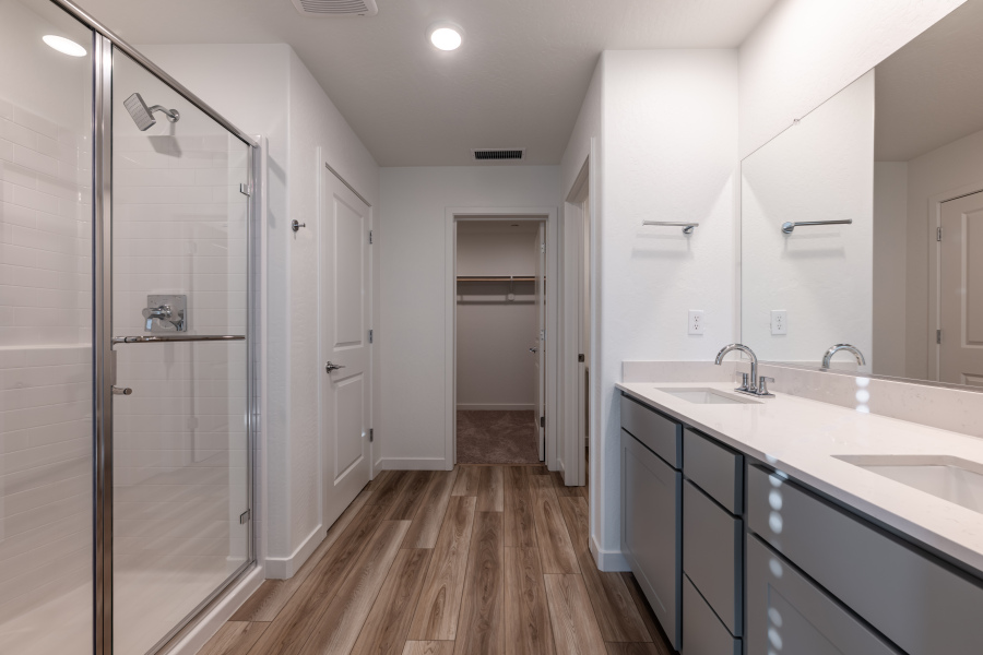 A bathroom with a glass shower.