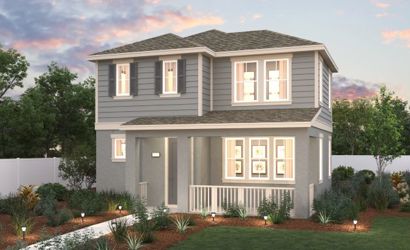 A house with a large front yard.