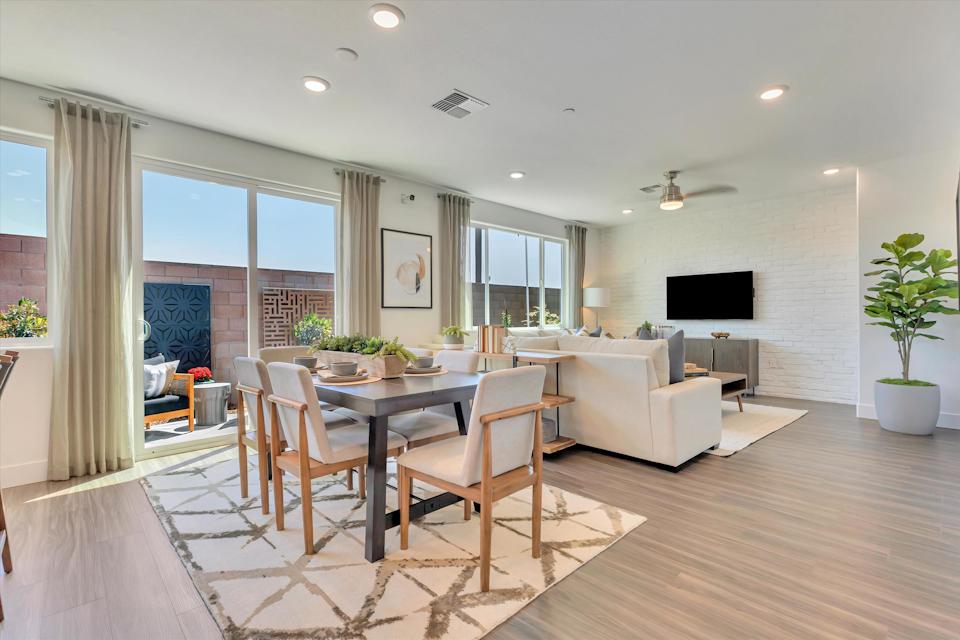 A living room with a large window.