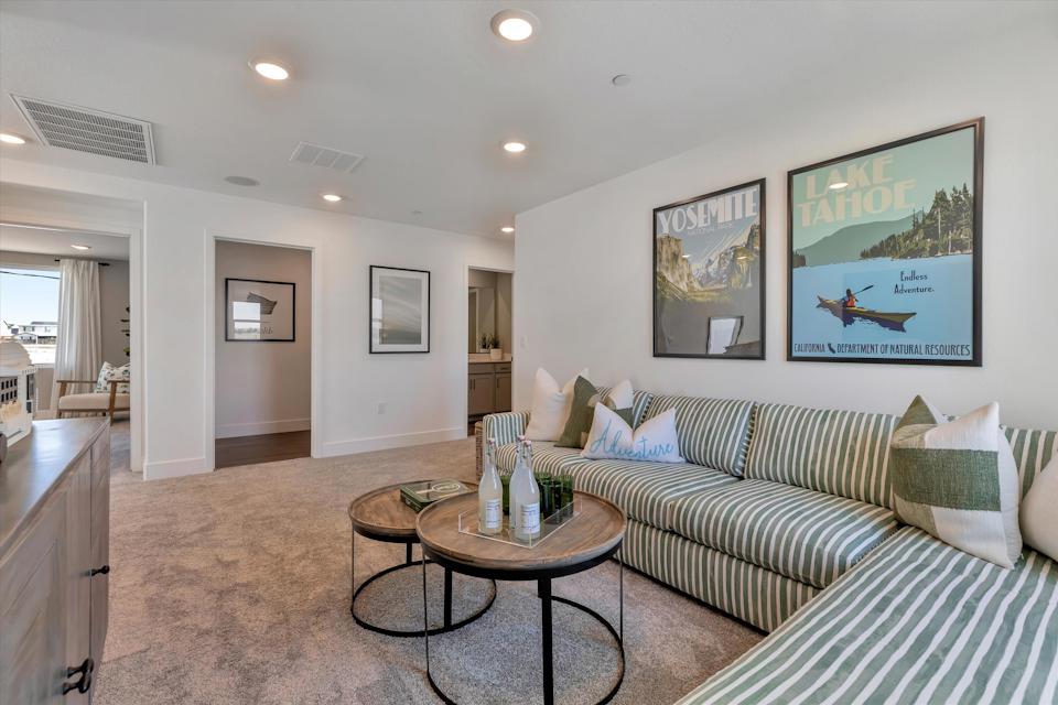 A living room with a couch and a coffee table.