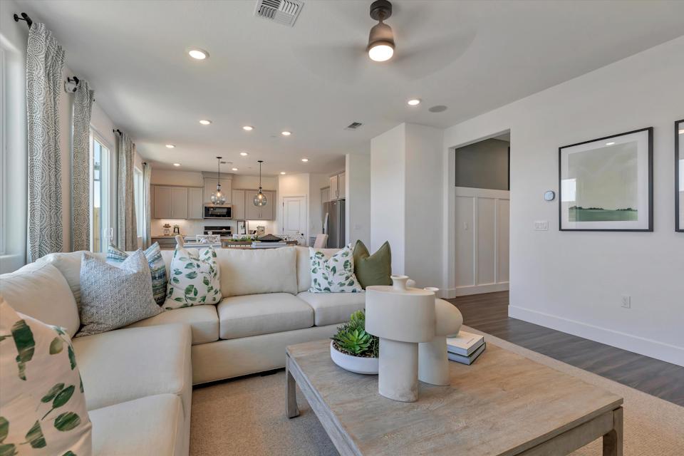 A living room with a couch and a coffee table.