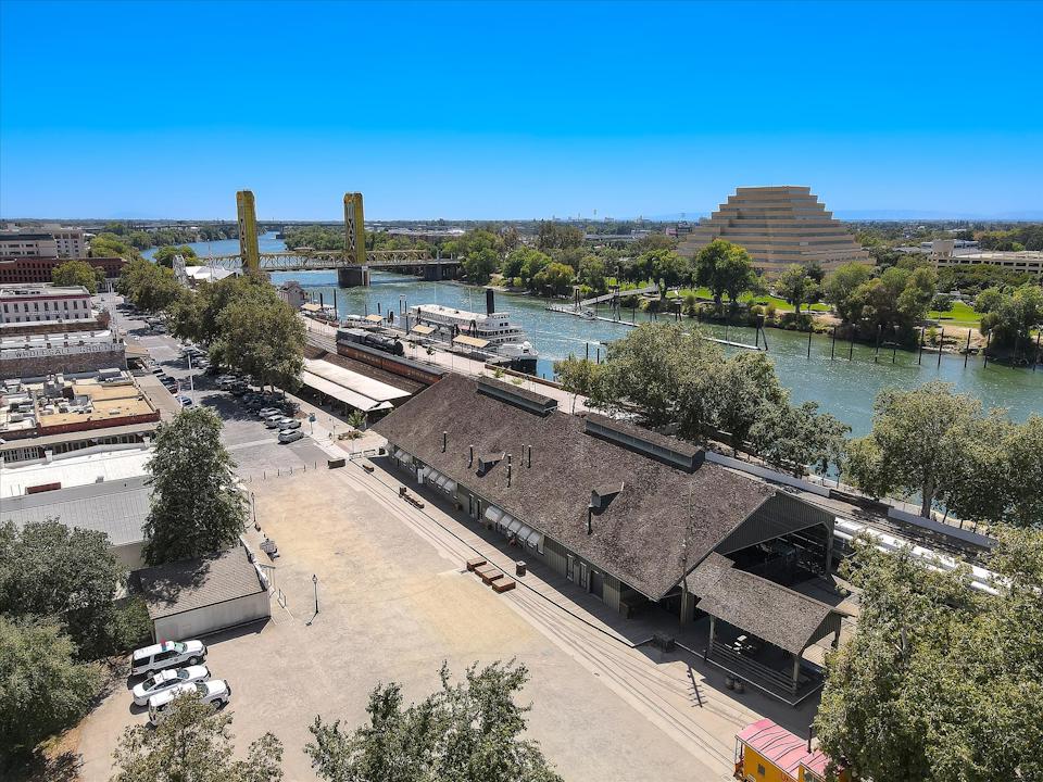 A large building with a river running through it.