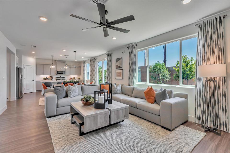 A living room with a large window.