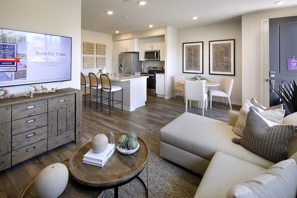 A living room with a large tv.