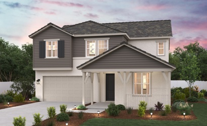 A house with a large front yard.
