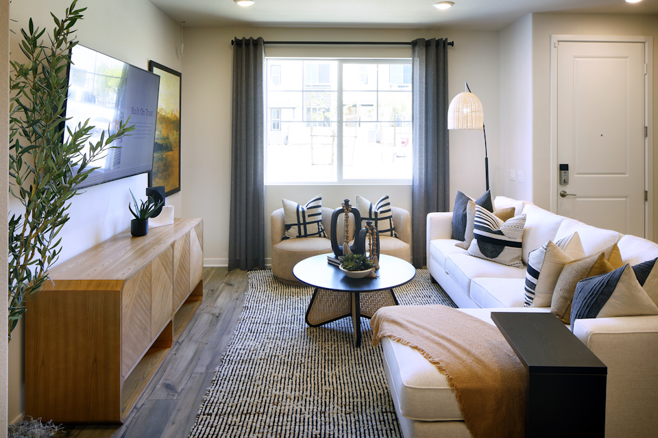 A living room with a couch and a coffee table.