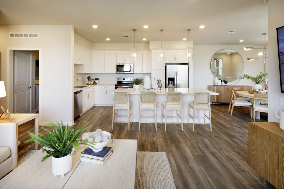A large kitchen with white cabinets.