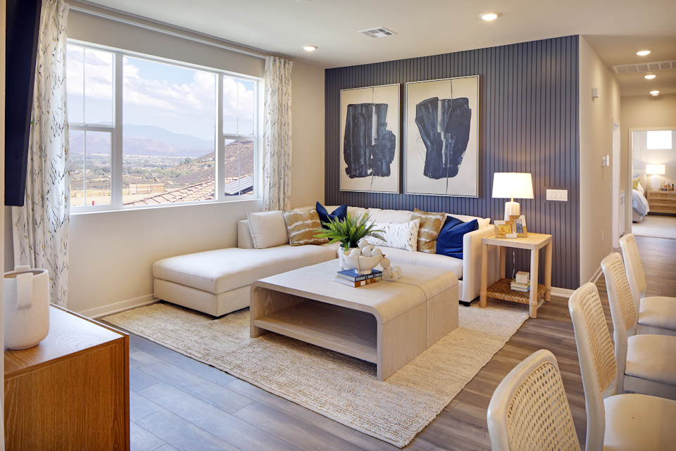 A living room with a large window.