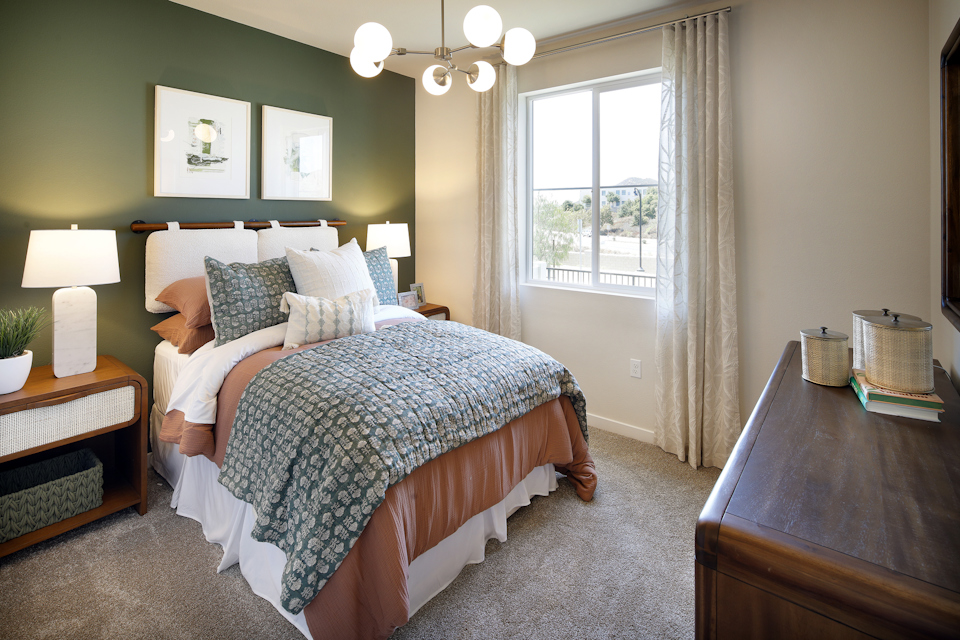 A bedroom with two beds.