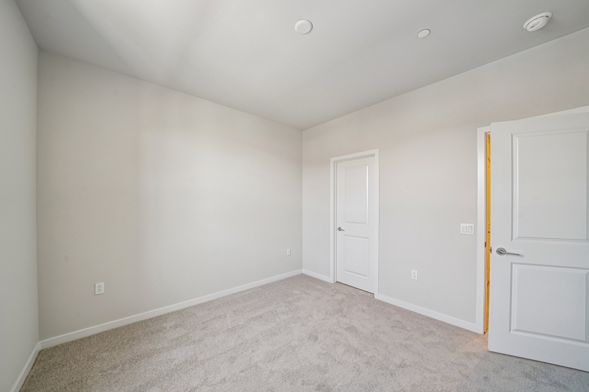 A room with white doors.