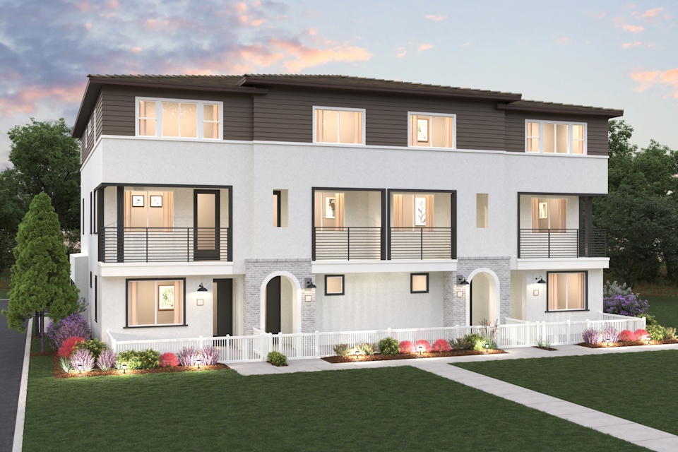 A large house with a lawn in front of it.