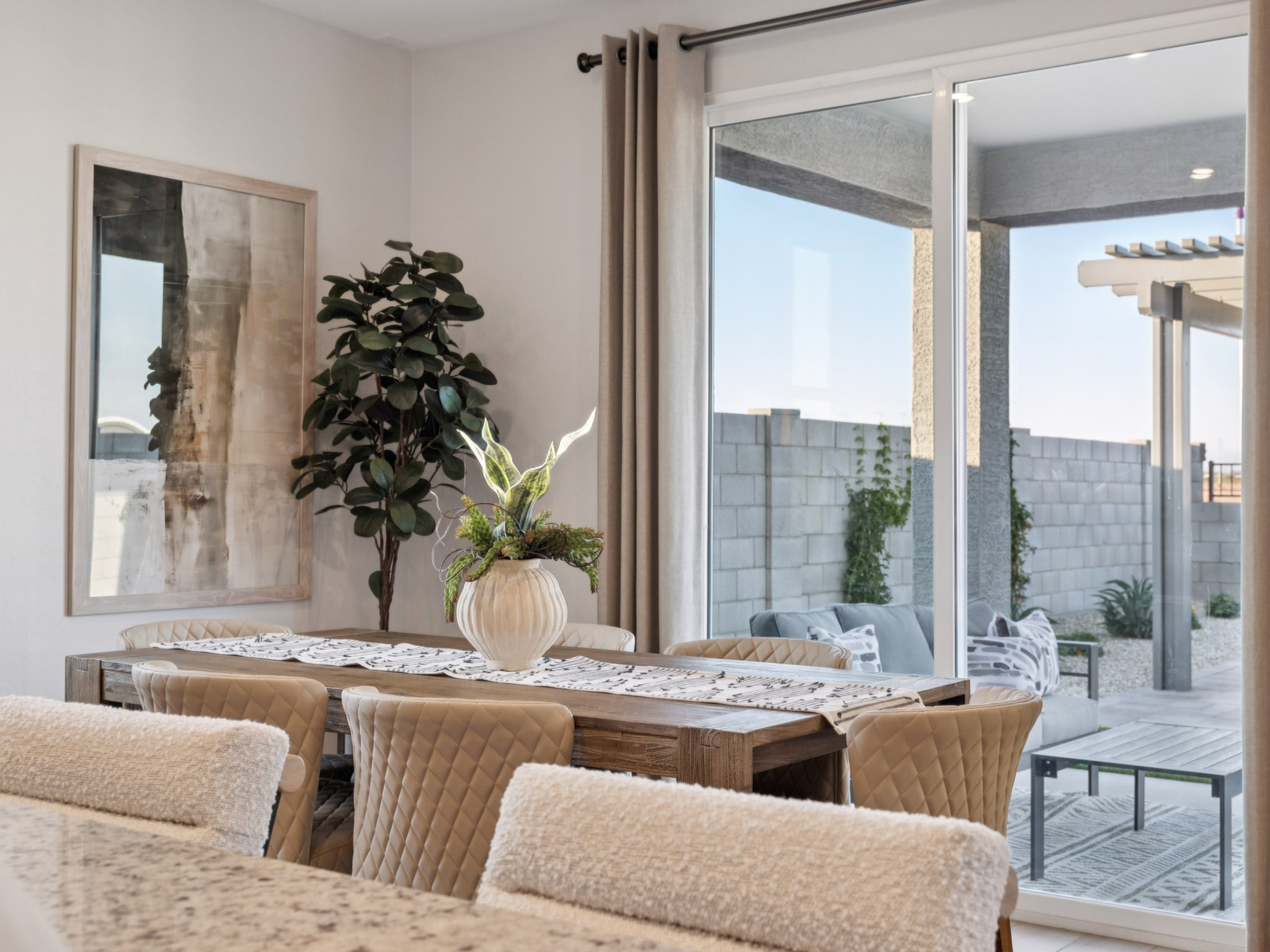 Oak Floor Plan Model Photo dining room with professionally designed interior features at North Copper Canyon Find your Dream Home in Surprise AZ with Community Amenities. 