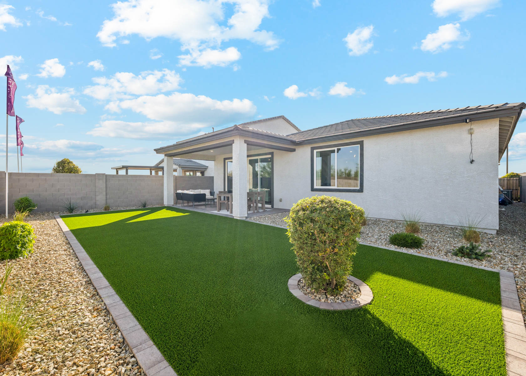 A house with a large front yard.