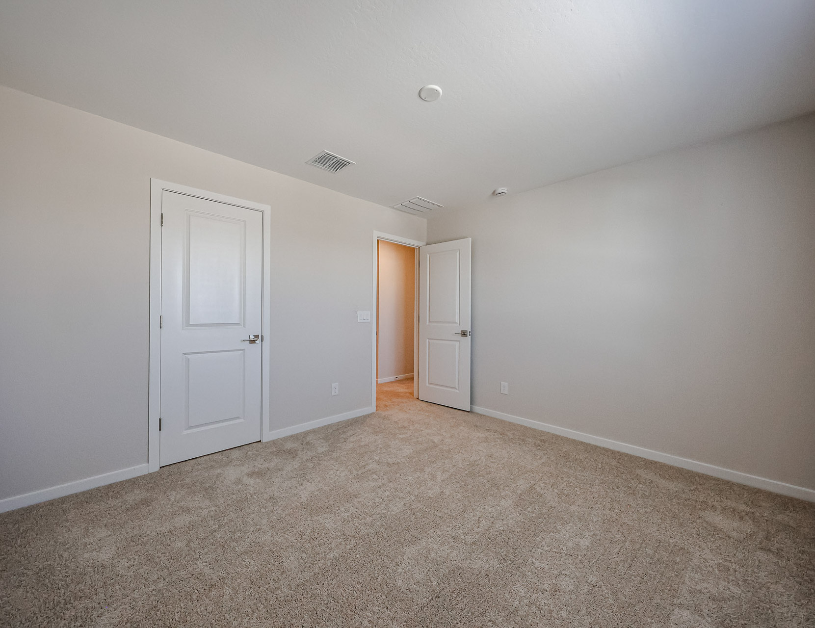 A room with white doors.