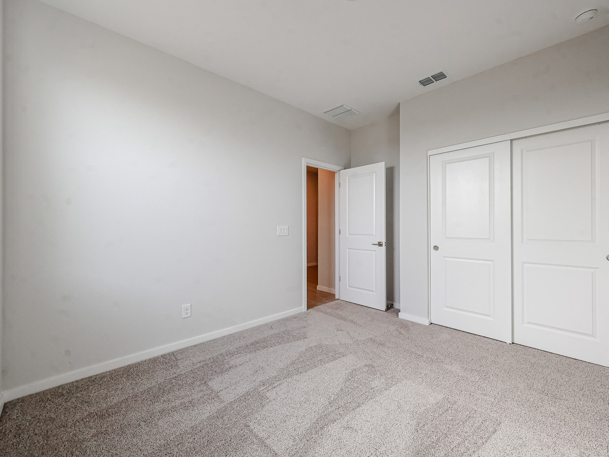 A room with white doors.