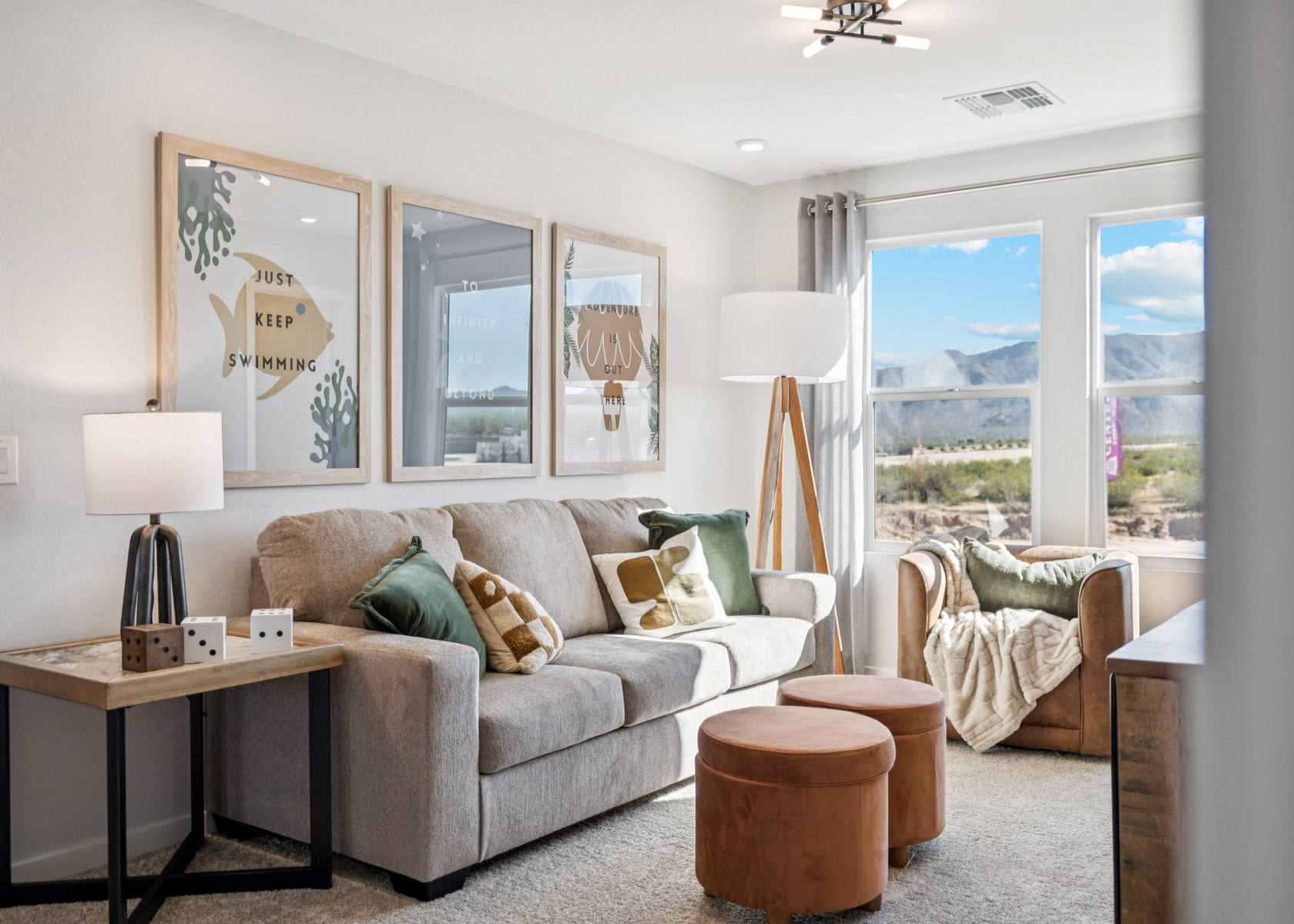 A living room with a couch and a table.