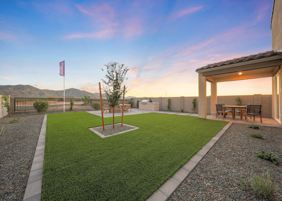 A building with a grass yard.