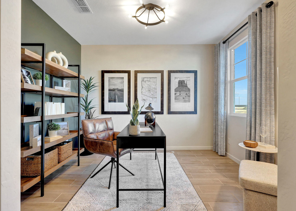 A room with a table and chairs.