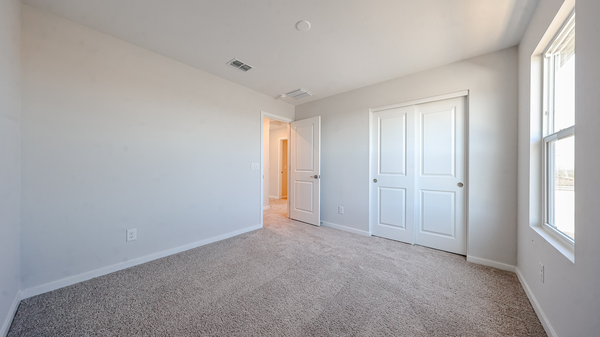 A room with white doors.