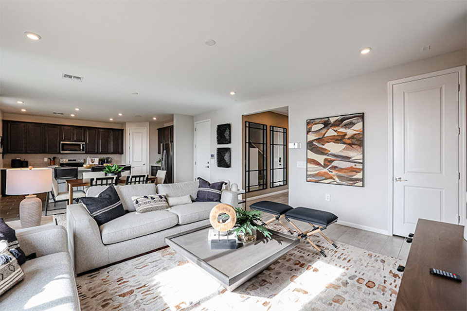 A living room with a couch and a coffee table.