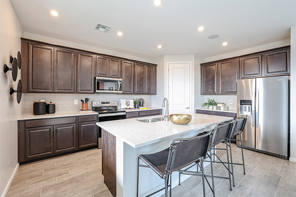 A kitchen with a large island.
