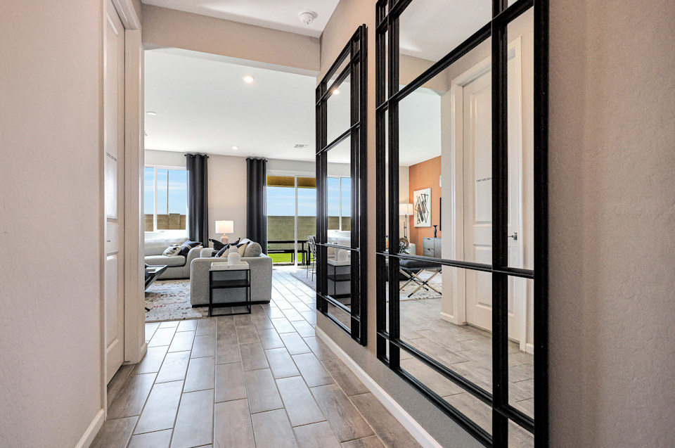 A hallway with glass doors.