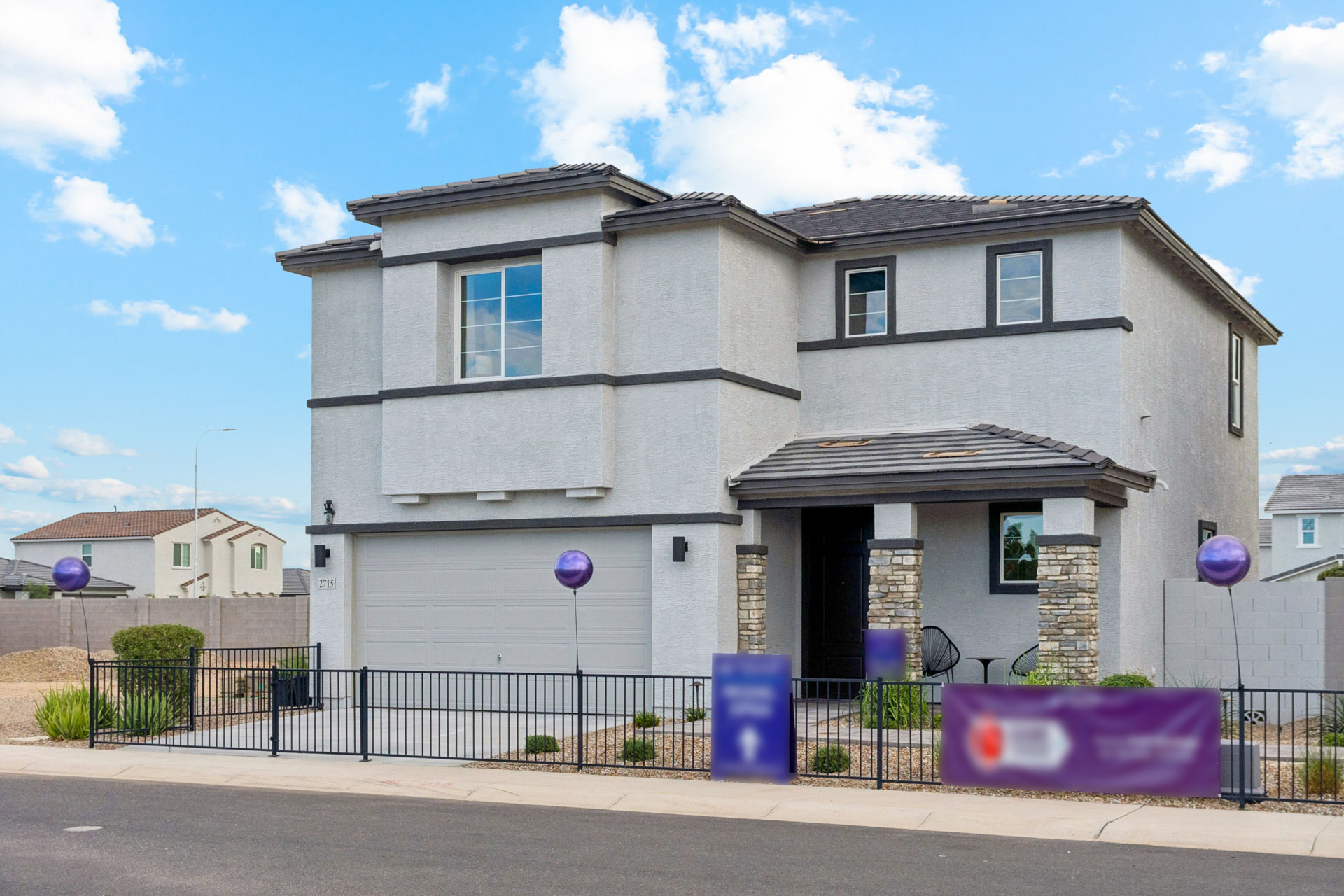 A house with a fence around it.