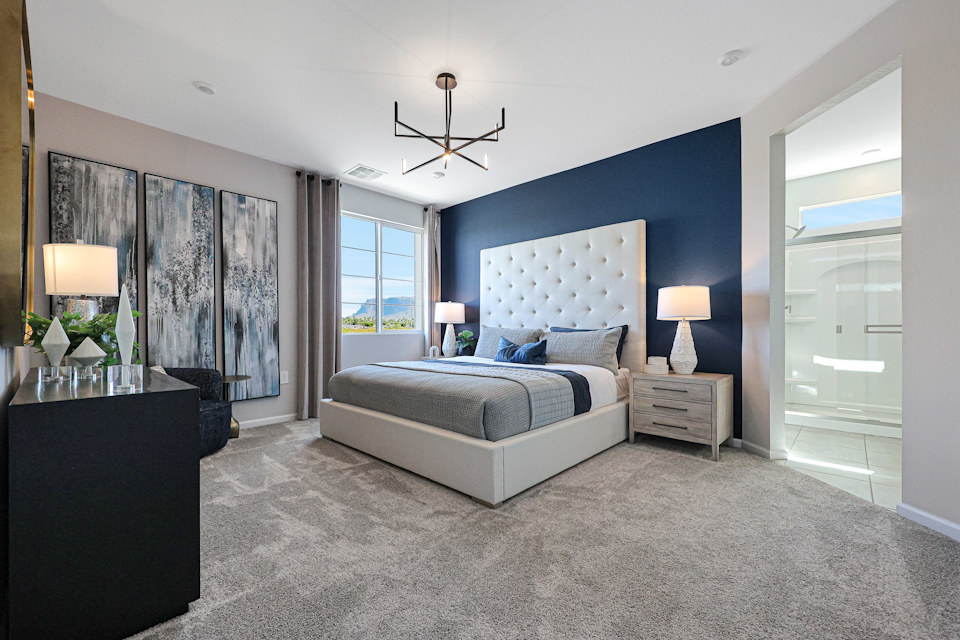 A bedroom with a large bed.