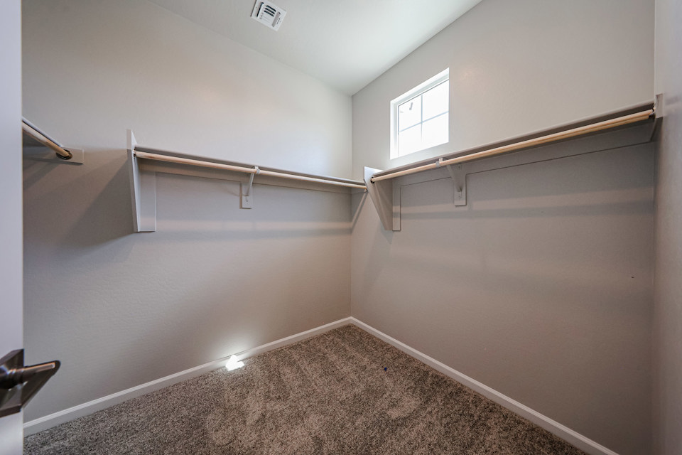 A room with a metal bar.