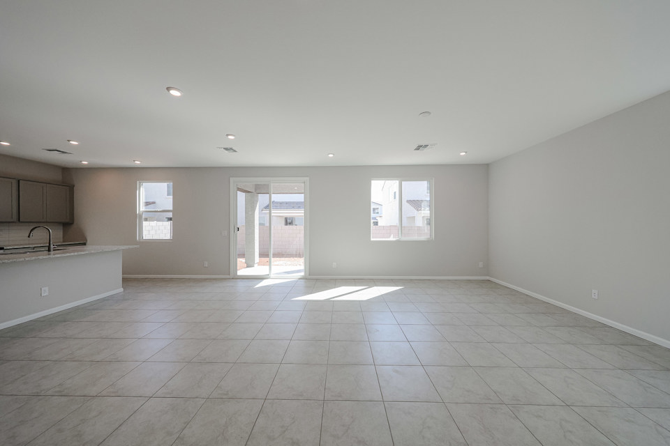A large empty room with white walls.
