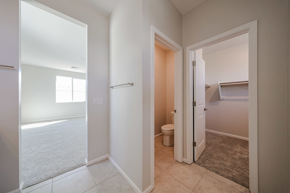 A bathroom with a shower unit.