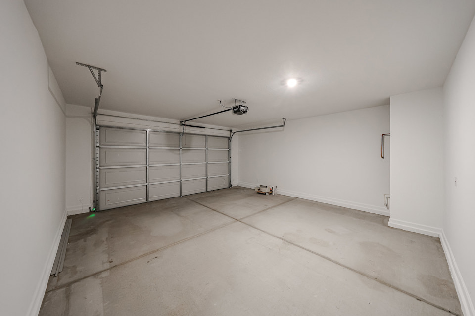 A room with a metal gate.