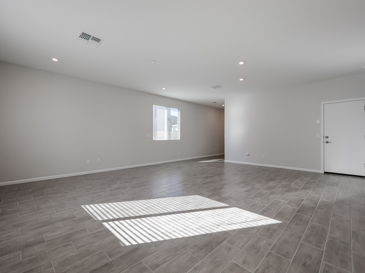 A room with a rug and a rug.