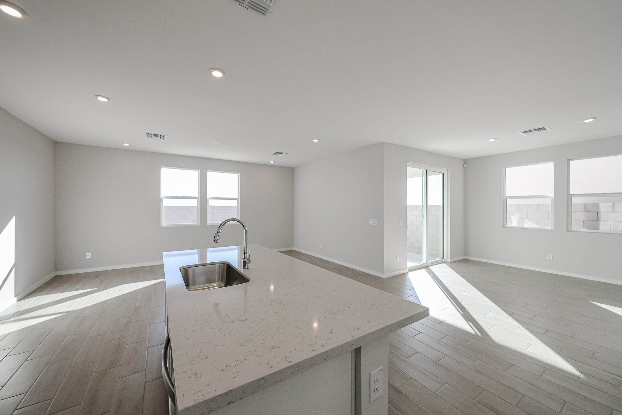 A large kitchen with a large island.