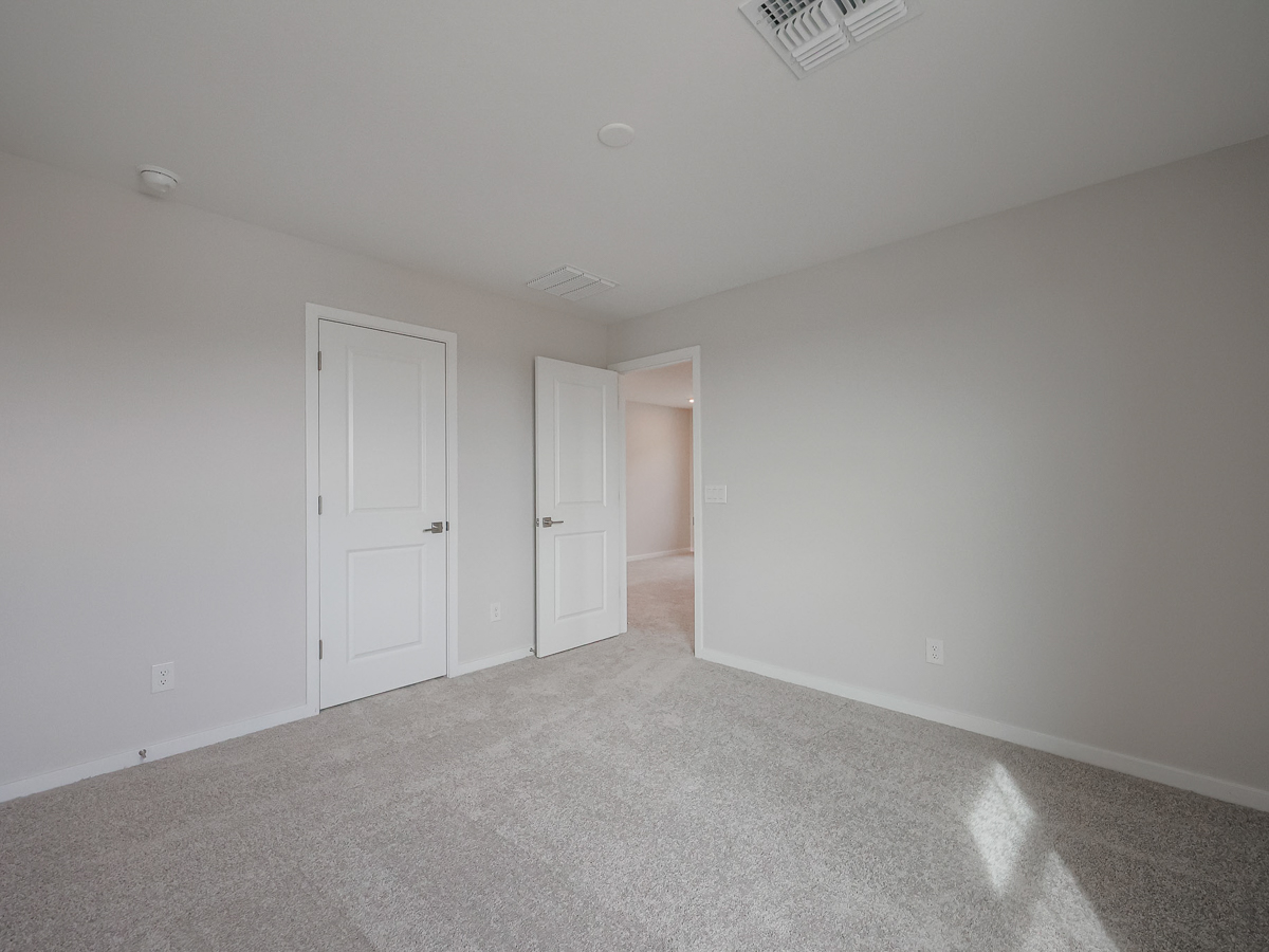 A room with white doors.