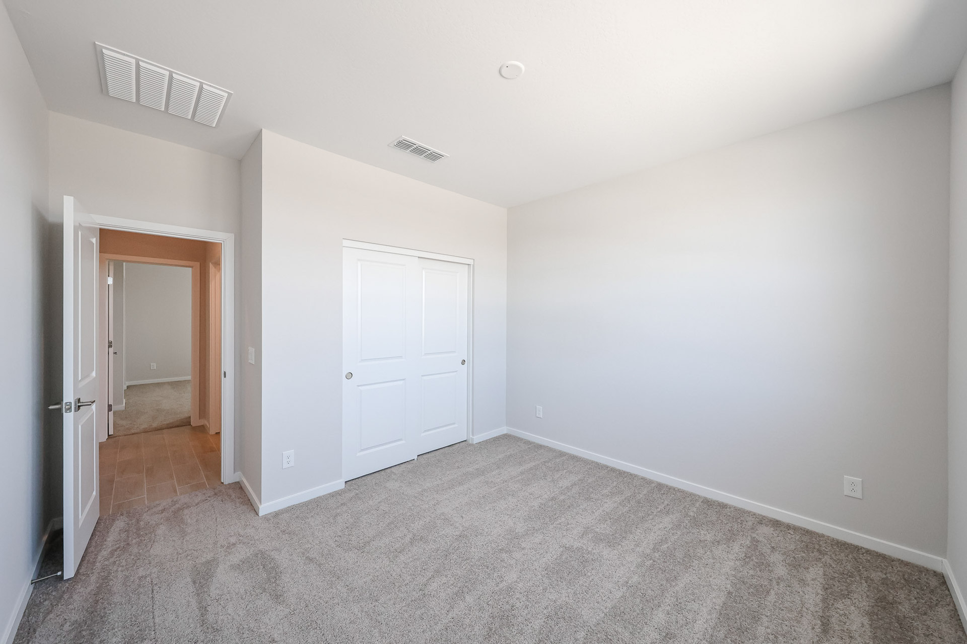 A room with white doors.