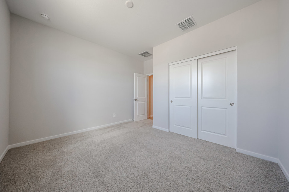 A room with white doors.