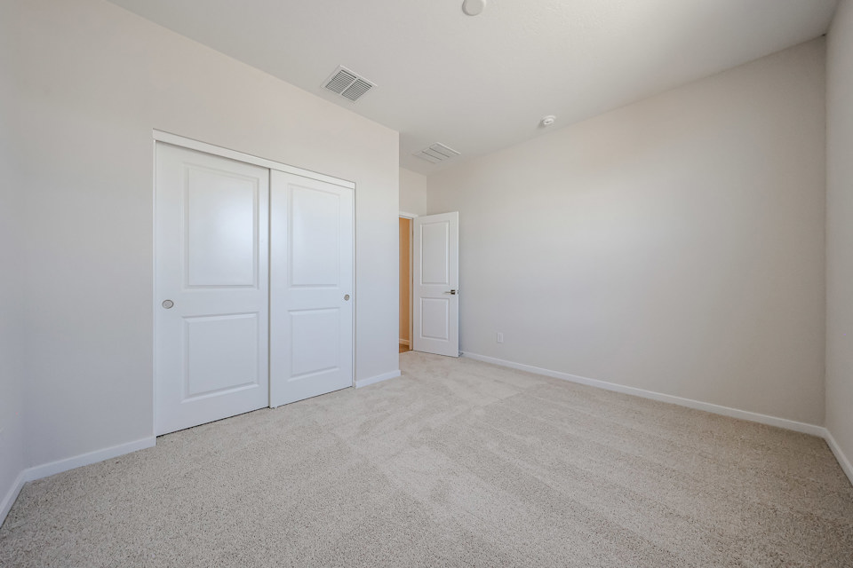 A room with white doors.