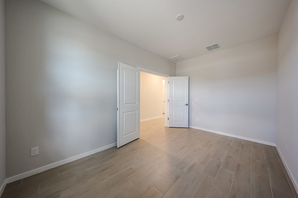 A room with white doors.