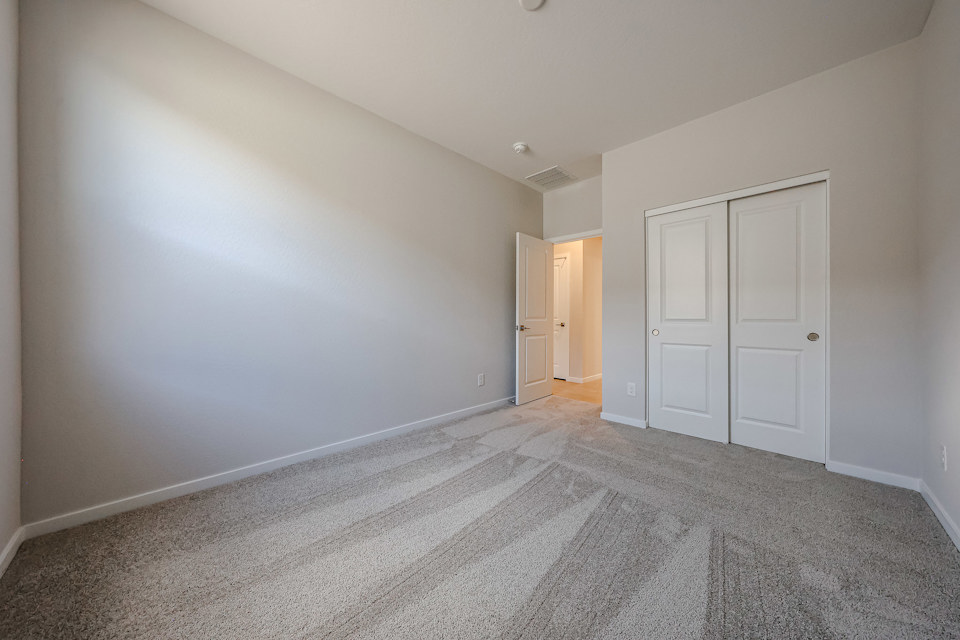 A room with white doors.