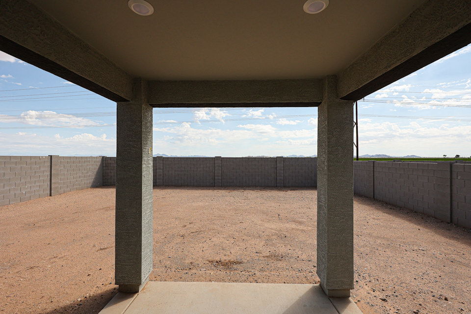 A concrete structure with a fence around it.