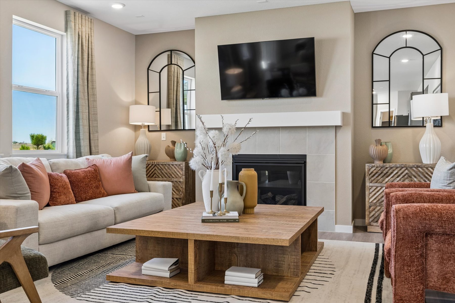A living room with a fireplace.