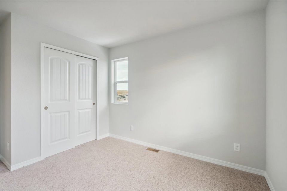 A room with white doors.